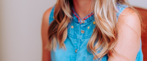 Lionel Messi holding the World Cup trophy with confetti falling around